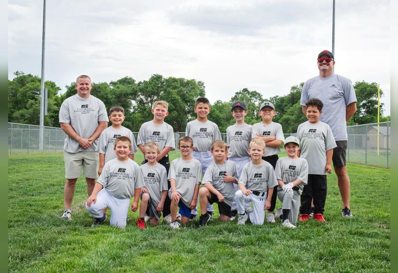 Back row from left: Coach Micah Chrisinge, Leumas Alejandro, Donovan Twyford, Jaxston Kottwitz, Jensen Worrell, Eli Ide, Braxton Wagnon, and Coach Jared Crick. Front row: Emmet Bauer, Nolan Husak, Maxxon Chrisinger, Dean Wolfe, Bayler Crick, and Seyerson Smith. (Katie Arndt Photography) 